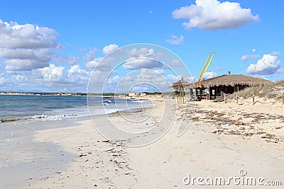 Lonely Platja Es Trenc beach panorama, bamboo hut beach bar and Mediterranean Sea on Majorca Stock Photo