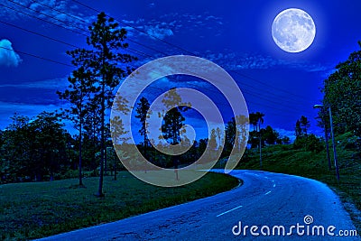 Lonely road in the country at night Stock Photo