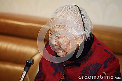 Lonely and sad Asian Chinese 90s old woman Stock Photo