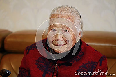 Lonely and sad Asian Chinese 90s old woman Stock Photo