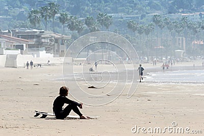 Lonely surfer Stock Photo