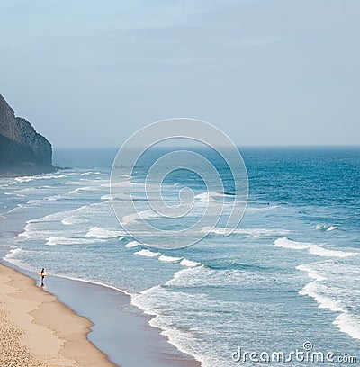 lonely surfer Portugal Stock Photo