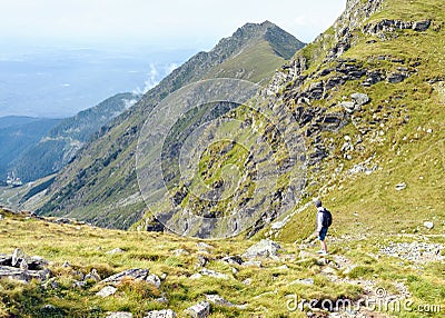 Lonely tourist exploring Fagaras Mountains near Balea Lake Stock Photo