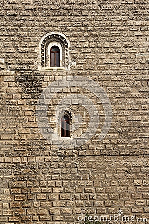 Lonely windows on a big monastery Stock Photo