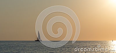 Lonely yacht in the sea Stock Photo