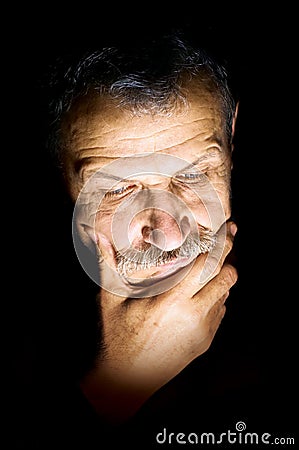 Lonelyness of old man Stock Photo