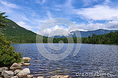 Lonesome Lake is a pristine glacial lake in Franconia Notch State Park in Franconia, NH Stock Photo