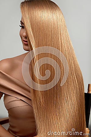 Long Blonde Hair. Beautiful Woman With Healthy Straight Hair Stock Photo