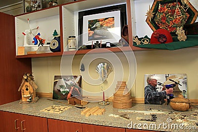 Long counters with crafts made from courses offered,Folk Art School,Lake Luzerne,2015 Editorial Stock Photo