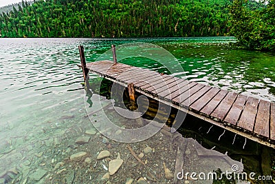 Long Dock and Amazing View of a Lake Stock Photo