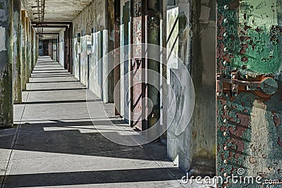 Long and Empty Hallway in Abandoned Military Fort Stock Photo