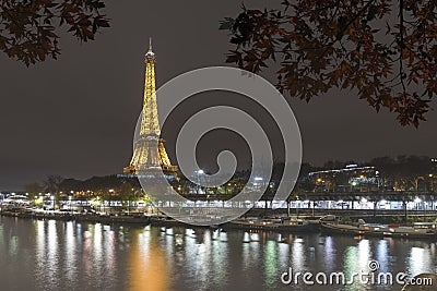 Illuminated Eiffel tower in Paris Editorial Stock Photo
