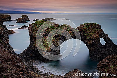 Long exposure of Gatklettur arch rock near Hellnar ,Snaefellsnes Peninsula ,Iceland. Stock Photo