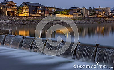 Long exposure night view of weir on the Saigawa River,Japan Stock Photo
