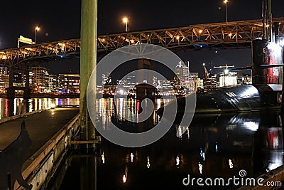 Nighttime Long Exposure Riverfront Photo of Downtown Portland Oregon and Submarine Stock Photo