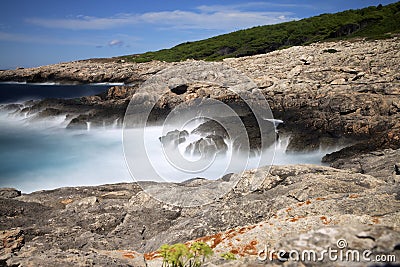 Long exposure sea on rocks. Tremiti, Apulia. Italy Stock Photo