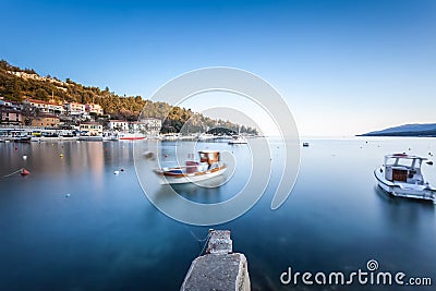 Long exposure shot of croatian bay in Labin city taken at dawn at blue hour Editorial Stock Photo