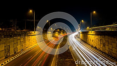 Long exposure shot of light trails of busy trafic freeway Stock Photo
