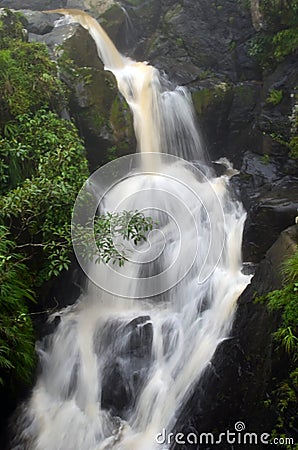 Long exposure shot of a waterfall. Milky shots of water flowing from the mountain Stock Photo