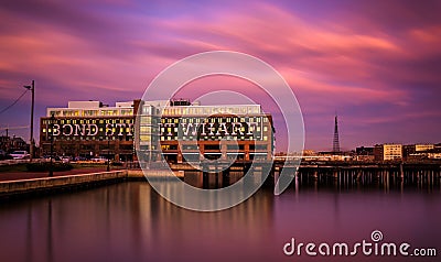 Long exposure at sunset of Bond Street Wharf in Fells Point, Baltimore, Maryland. Editorial Stock Photo