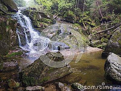 Long exposure waterfall Poledni vodopad in Jizerske hory mountain Stock Photo