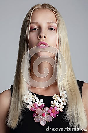 Long Hair Blonde with Vernal Garland on her Neck Stock Photo