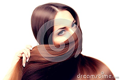 Long hair. Hairstyle. Hair Salon. Fashion model with shiny hair. Stock Photo