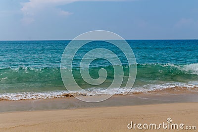 Ocean tide waves on paradise sandy beach Stock Photo