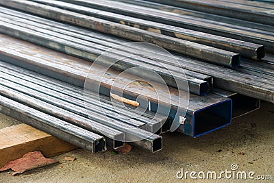 Long metal beams at construction site Stock Photo