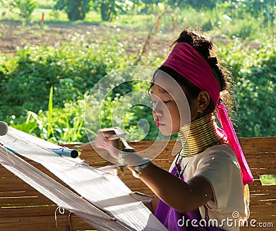 Long neck tribe woman weaving Editorial Stock Photo