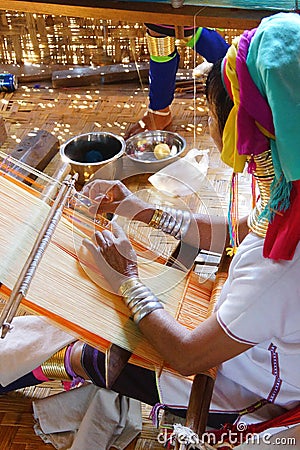 Long necked Kayan Padaung woman weaving Editorial Stock Photo