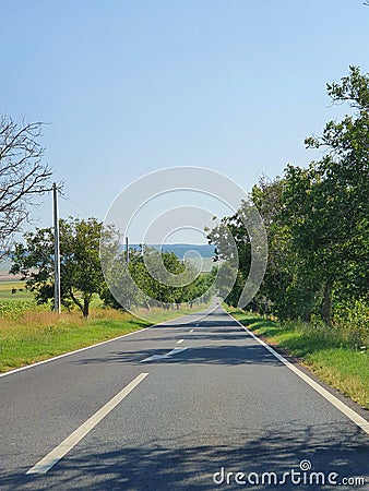 Long and quiet road in Dobrogea Stock Photo