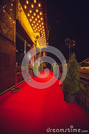 Long red carpet between rope barriers on entrance. Editorial Stock Photo