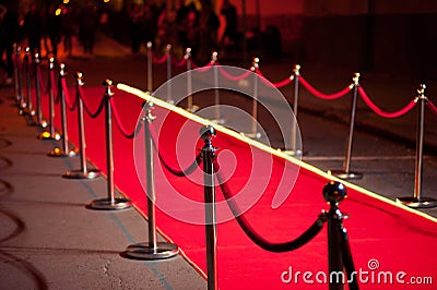 Long Red Carpet - is traditionally used to mark the route taken by heads of state on ceremonial and formal occasions Stock Photo