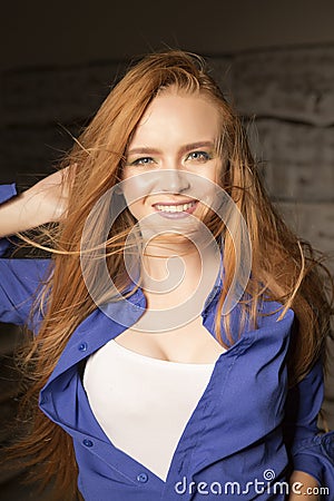 Long Red Hair and an Amazing Smile Stock Photo