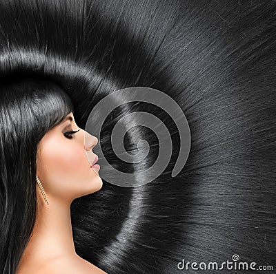 Long shiny hair of a beautiful brunette Stock Photo