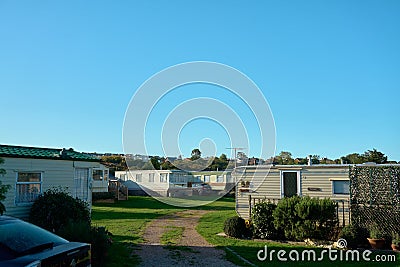 Long shot of a trailer park at the west beach pavilion caravan site in Whitstable, Kent. Editorial Stock Photo