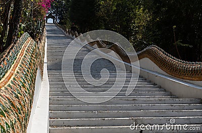 A long stairs to reach buddhist temple Stock Photo