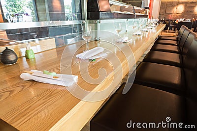 Long table in the cozy cafe Stock Photo