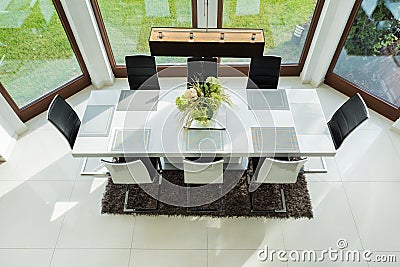 Long table in dinning room Stock Photo