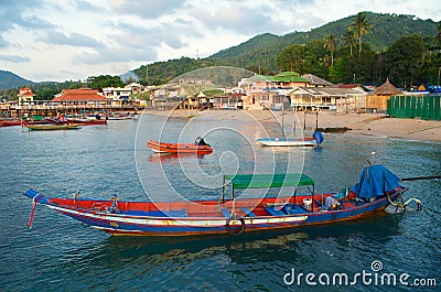 Long-tail traditional thai boat in the port Editorial Stock Photo