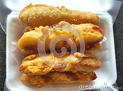 6 pieces long, thick fried bananas Stock Photo