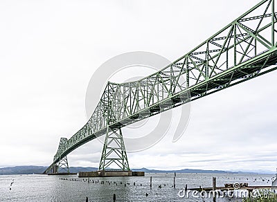 Long truss Astoriaâ€“Megler Bridge across the mouth of the Columbia River at Pasific ocean Stock Photo