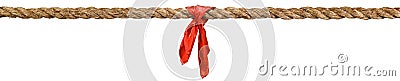 Long tug of war rope pulled tight, with red ribbon tie. Concept of conflict, competition, or rivalry. Stock Photo