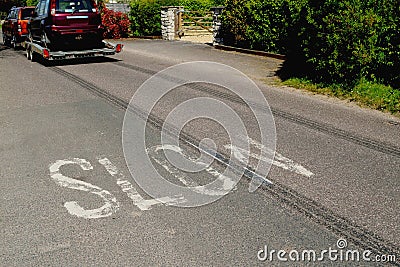 Long tyre track on the road Stock Photo