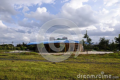 Long view of city bus stand building with isolated in Gulbarga University campus Kalaburagi Editorial Stock Photo