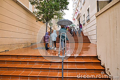 A long, winding staircase connecting different levels of homes and apartments Editorial Stock Photo