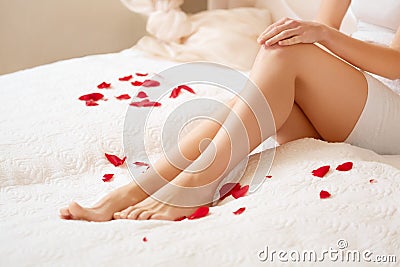 Long Woman Legs. Beautiful Woman Cares About Legs. Depilation Stock Photo