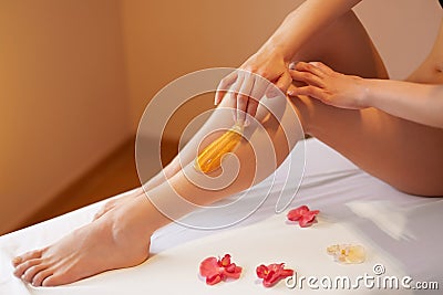 Long Woman Legs. Woman Cares About Her Legs. Sugaring Treatment Stock Photo