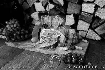 Wine, cheese and grapes - a tasty dinner Stock Photo